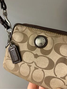 Rehab Coach Tan/Brown Signature Canvas Wristlet